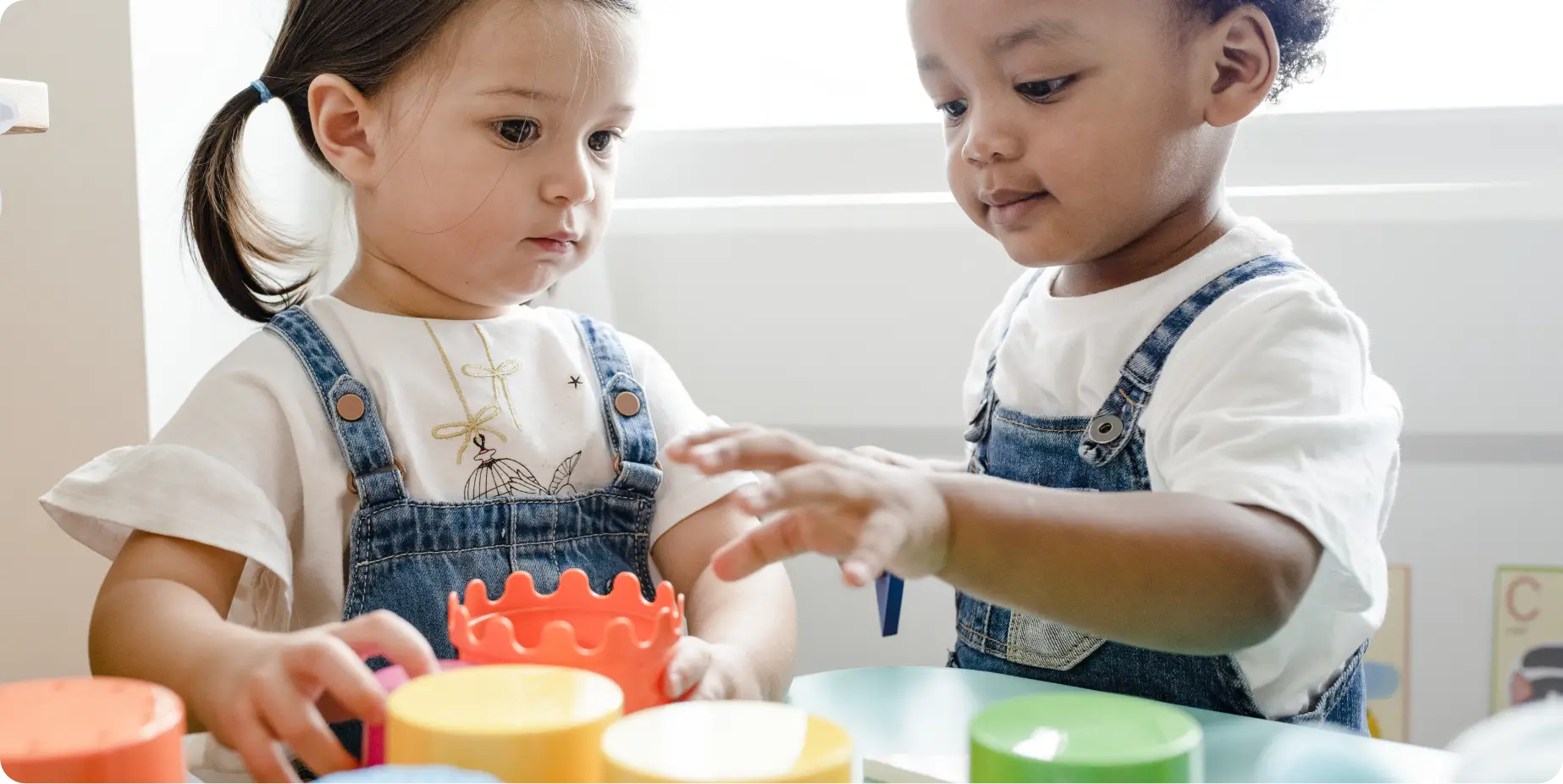 little-kids-playing-toys-learning